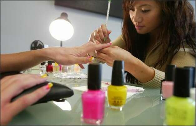 Tien Tran, owner of Couture Nails & Spa in the Central District,