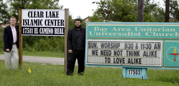 Samuel Schaal, minister of the Bay Area Unitarian Universalist Church, left, and Waleed Basyouni, the imam of the Clear Lake Islamic Center, share a spirit of understanding as well as land. Photo: Karen Warren, Chronicle