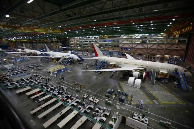 The 787 assembly line is shown with planes being assembled for, from right, Air India, United Airlines, and Ethiopian Airlines during a 787 tour at the Boeing assembly plant in Everett on Sunday, September 25, 2011. 