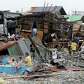 Residents salvage housing materials from a Manila Bay community.... photo: 1633490 slideshow 31095