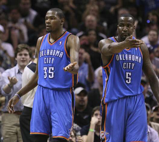 Oklahoma City Thunder's Kevin Durant (35) and Oklahoma City Thunder's Kendrick Perkins (5) gesture for possession of the ball during the first half of game two of the NBA Western Conference Finals in San Antonio, Texas on Tuesday, May 29, 2012. Edward A. Ornelas/Express-News (Edward A. Ornelas / San Antonio Express-News) / SA