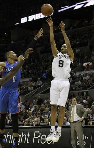 San Antonio Spurs' Tony Parker (9) shoots over Oklahoma City Thunder's Russell Westbrook (0) during the second half of game two of the NBA Western Conference Finals in San Antonio, Texas on Tuesday, May 29, 2012. Kin Man Hui/Express-News (Kin Man Hui / San Antonio Express-News) / SA