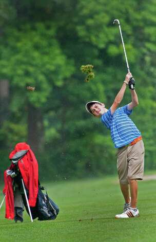 Playing in the boys 14 to 17 year old division Eric Ganshaw hits off the fairway of the 18th hole in the Greenwich Townwide Jr. golf championships held at Griffith E. Harris golf course, Greenwich, CT on Wednesdy August 15th, 2012. Photo: Mark Conrad / Stamford Advocate Freelance