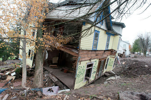 A view of a condemned home at 14602 Main St. in Prattsville on Thursday, Oct. 13, 2011. Many of the homes in the town were badly damaged by Tropical Storm Irene and the flooding it brought.  (Paul Buckowski / Times Union) Photo: Paul Buckowski / 00014963A