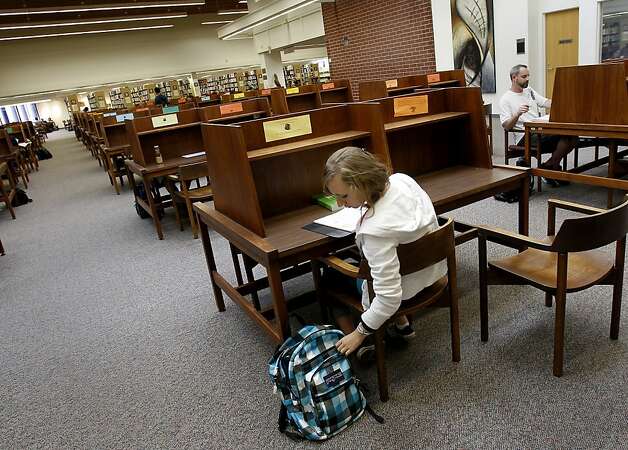 The campus library at Diablo Valley College in Pleasant Hill is nearly empty at the end of the day as the community college has suffered from budget cuts, its student population down 700 from last fall. Photo: Brant Ward, The Chronicle / SF