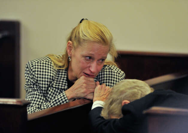 Michelle Lorenz Valicek (left) and her mother, Myra Lorenz, react to Valicek being given 10 year probation after a no-contest plea of embezzlement. Photo: Robin Jerstad/For The Express-Ne / SA