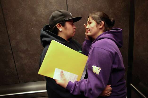 Kelly Middleton, 24, and her partner Amanda Dollente, 29, embrace after they received their marriage license at the King County Administration Building on Wednesday, December 5, 2012. Photo: JOSHUA TRUJILLO / SEATTLEPI.COM
