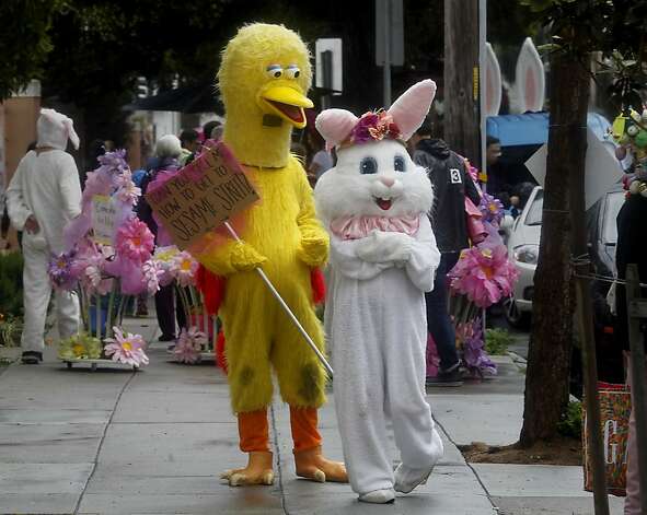 Big Bird and the Easter Bunny waited on a side street for the parade to begin. The 22nd annual Easter Parade and Spring Celebration on Union Street in San Francisco, Calif. attracted thousands of people on a slightly rainy day Sunday March 31, 2013. Photo: Brant Ward, The Chronicle