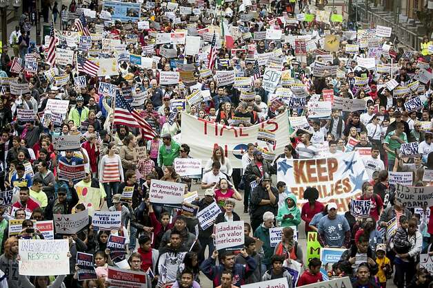 Thousands of supporters of an immigration overhaul demonstrate in Minneapolis, one of more than 150 rallies held nationwide. Photo: Jenn Ackerman, New York Times