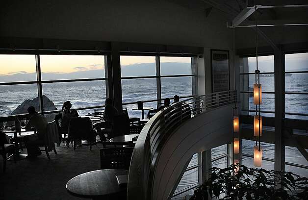 A view of Seal Rock from the Bistro lounge at the Cliff house in San Francisco, Calif.,  during sunset on Thursday, November 10, 2011. Photo: Liz Hafalia, The Chronicle
