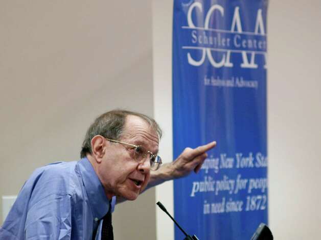 Author Jonathan Kozol addresses those gathered at a conference put on by the Schuyler Center for Analysis and Advocacy on Thursday, Nov. 7, 2013 in Albany, NY.   (Paul Buckowski / Times Union) Photo: Paul Buckowski / 00024562A