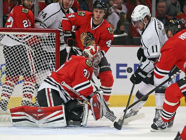 Chicago's Antti Raanta stops a shot by Anze Kopitar, one of Raanta's 26 saves in his first career shutout. Photo: Jonathan Daniel, Getty Images