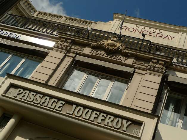 The south entrance to Passage Jouffroy, which passes by two hotels and includes entrances to the wax museum. Photo: Spud Hilton, The Chronicle