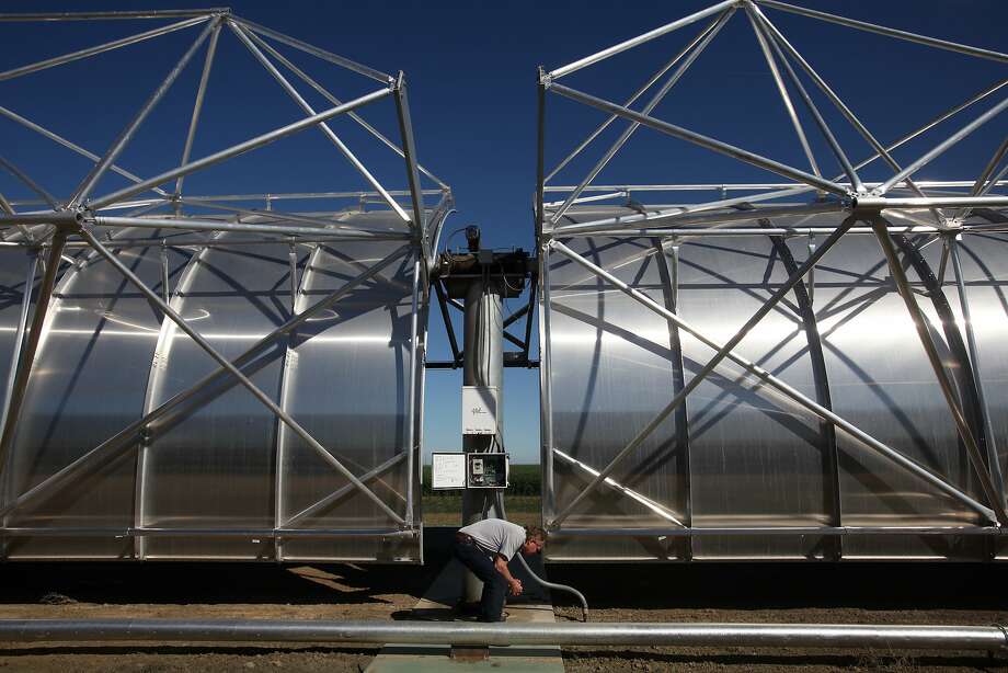 Consultant Bruce Marlow demonstrates a feature at the solar-powered WaterFX desalination plant in Fresno County. Photo: Leah Millis, The Chronicle