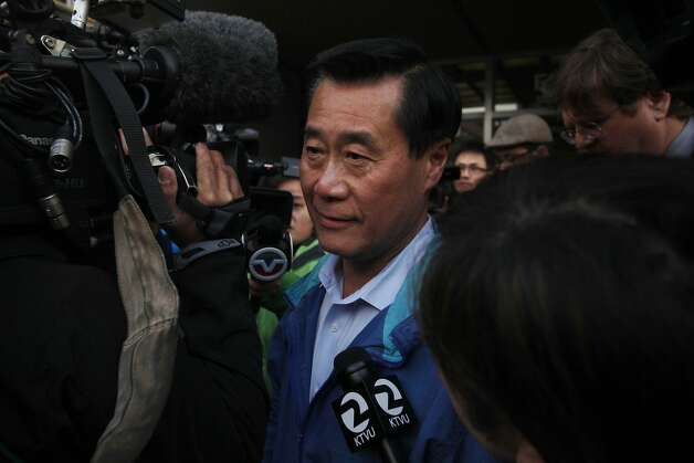 State Sen. Leland Yee makes his way through a large flock of media members to a car after being released on a $500,000 bond March 26, 2014 outside of the Federal Courthouse in San Francisco, Calif. State Sen. Leland Yee was arrested on public corruption charges early Wednesday morning. Photo: Leah Millis, The Chronicle