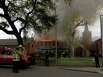Houston firefighters worked to contain a two-alarm fire at the Heights Presbyterian Church at 240 W. 18th Street on March 26 in Houston.