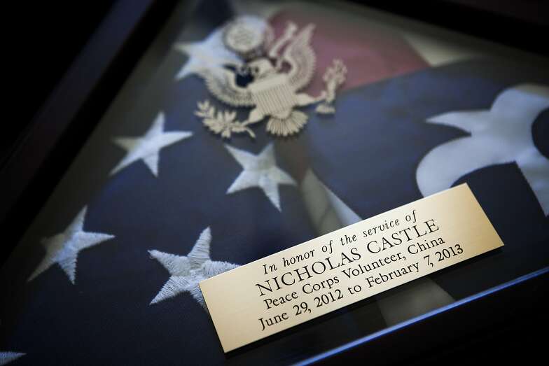 A folded flag given to Dave and Sue Castle after their son, Nick, died while serving in China as a Peace Corps volunteer, in Brentwood, Calif., April 28, 2014. The story of Nick Castleâ€<sup>TM</sup>s death raises serious questions about the Peace Corps medical care and how the agency responded to a volunteerâ€<sup>TM</sup>s dangerous illness. (Max Whittaker/The New York Times)