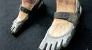 Vibram's FiveFingers shoes force runners to get up on the balls of their feet in a natural gait, adherents say.