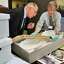NYS Museum director Clifford Siegfried, left, and curator of history, Craig Williams examine a new trove of archival items from the controversial Attica prison uprising 40 years ago, now at the NYS Museum in Albany Wednesday Sept. 21, 2011.   (John Carl D'Annibale / Times Union)
