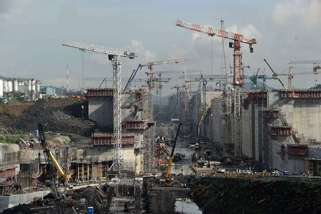 View of the Panama Canal locks under construction in Cocoli, near Panama City, on August 8, 2014. Next August 15 marks the 100th anniversary of the Panama Canal, considered to be one of the 20th century's marvels of engineering and through which goes five percent of the maritime world trade. Panama took control of the 80-km-long canal and the 1,426-square-km enclave that surrounds it at midnight on December 31, 1999 according to the 1977 handover treaty signed by then-presidents of the US, Jimmy Carter and Panama, Omar Torrijos.   AFP PHOTO/ Rodrigo ARANGUARODRIGO ARANGUA/AFP/Getty Images Photo: Rodrigo Arangua, AFP/Getty Images