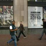 Pedestrians walk outside the new locally owned grocery store named Market on Market on the first floor of the Twitter building  in San Francisco, Calif., on Thursday, October 23, 2014.  Under construction Market on Market is scheduled to open by the holidays.