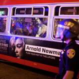 Windows are smashed on a bus after the San Francisco Giants beat the Kansas City Royals 3-2 in Game 7 of the World Series at Civic Center Plaza in San Francisco, Calif. on October 29, 2014.