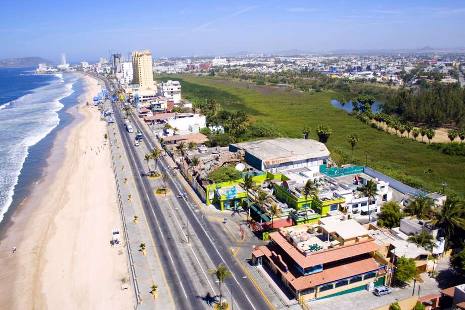 Mazatlan's malecon, the seafront walk tracing its long crescent beach, is one of the world's longest at more than 14 miles. Photo: Mazatlan Tourism Board