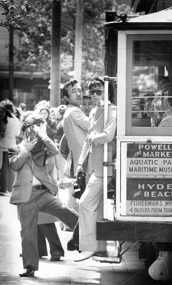 Tourists visit San FranciscoJapanese tourists take pictures at cable carPhoto taken 06/09/1977Photo ran 09/16/1984, pg. 6 Photo: John Storey, The Chronicle