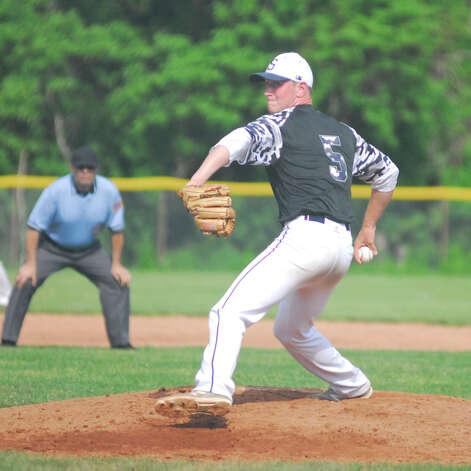 Staples sophomore Ben Casparius throws a pitch during a game against Warde on Tuesday in the FCIAC baseball quarterfinals. Staples won 3-0 as Casparius fired a one-hitter. Photo: Ryan Lacey/Staff Photo / Westport News Contributed