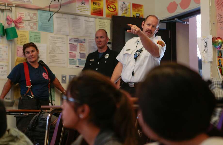 Captain Zack TIbbets fields questions from students in Ali Mayer's 9-12  grade Health Education class at Abraham Lincoln High School on Monday, Oct. 5, 2015 in San Francisco, Calif. Photo: Nathaniel Y. Downes, The Chronicle
