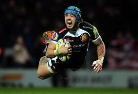 Jack Nowell of Exeter Chiefs dives over for his side's first try during the Aviva Premiership match between Exeter Chiefs and Gloucester Rugby at Sandy Park on January 3, 2015 in Exeter, England.
