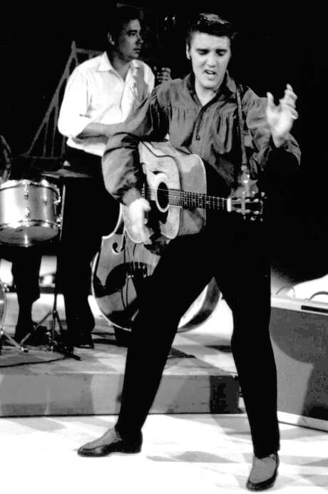 FILE - In this Sept. 9, 1956 file photo originally released by the Museum of Television & Radio, Elvis Presley performs on the "Ed Sullivan Show," in New York. (AP Photo/Museum of Television & Radio, file) Photo: Anonymous, Associated Press / MUSEUM OF TELEVISION & RADIO