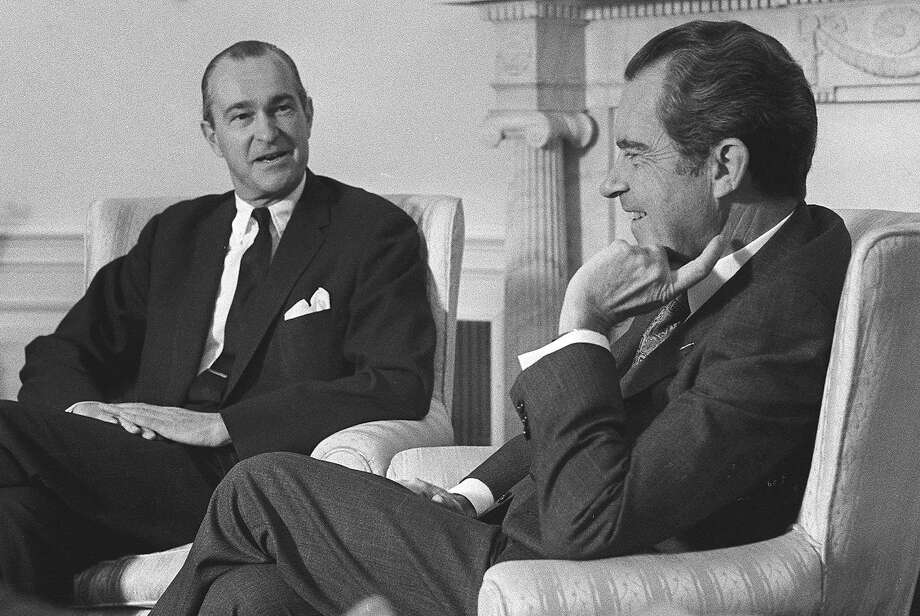 Ex CIA official Richard Helms (left), shown with President Richard Nixon in 1973, helped launch the program in the ’50s. Photo: AP