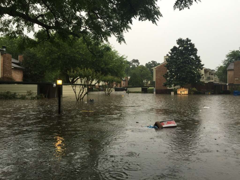 Nearly three feet of flood water hit townhomes in the Houston Heights. Photo: Robert P. Grattan/Houston Chronicle