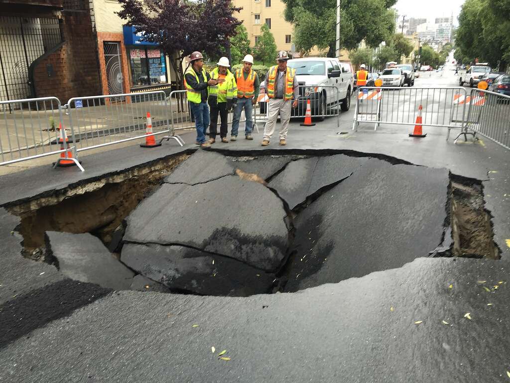 A large sinkhole formed on Sacramento Street between Lyon and Baker streets in San Francisco on April 21, 2016, after a sewer line broke. Photo: Kale Williams