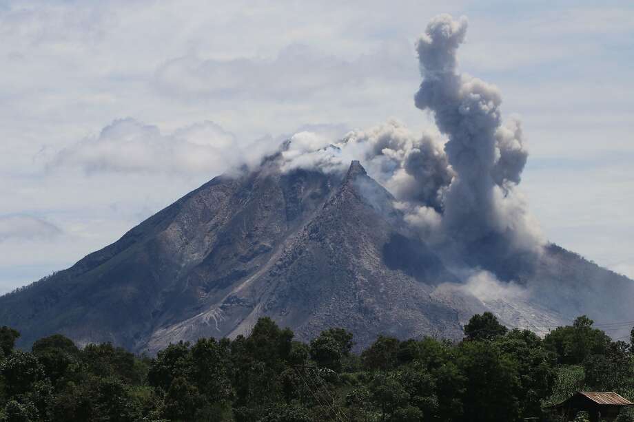 Mount Sinabung in Indonesia’s North Sumatra province spews clouds of hot, volcanic ash. Photo: ARDIANSYAH PUTRA, AFP/Getty Images