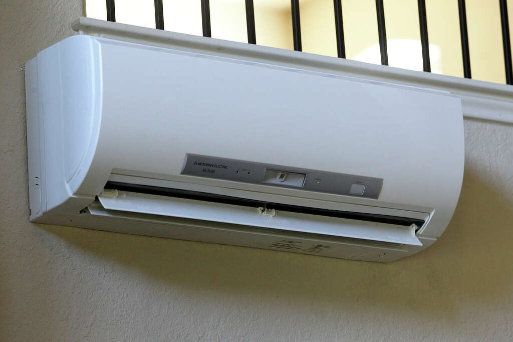 Why are mini split air conditioners a good choice for existing homes?