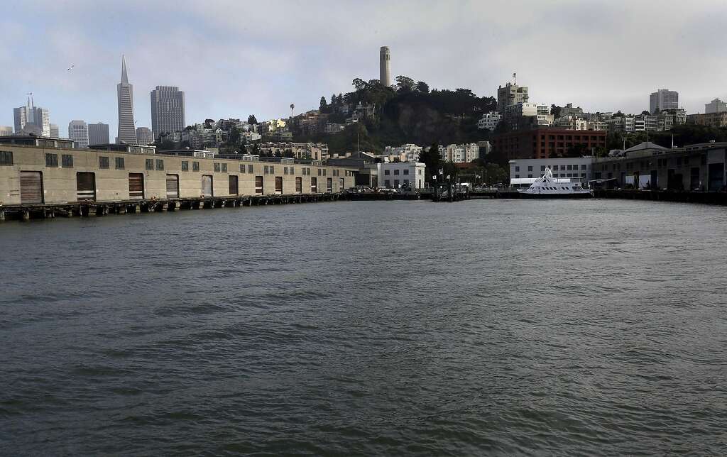 The Embarcadero meets the Bay as seen from the Alcatraz Ferry, on Thursday June 5, 2014, in San Francisco, Ca. Projections suggest that sea level rise in coming decades could place the Embarcadero and other shoreline districts in the Bay Area at risk — which is part of the reason for Bay Area: Resilient by Design, a competition where 10 multi-disciplinary teams will be awarded $250,000 each to explore how sea level rise can be prepared for here. The competition, which will be funded largely by New York’s Rockefeller Foundation, was announced on Jan. 23, 2017 and will run 15 months. Photo: Michael Macor, The Chronicle
