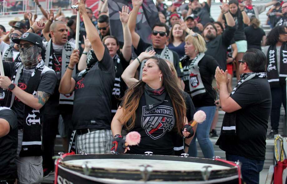 Amanda Rodriguez plays a drum as other Mission City Firm members cheer before the San Antonio FC soccer match on April 1, 2017 at Toyota Field. Photo: Edward A. Ornelas /San Antonio Express-News / © 2017 San Antonio Express-News