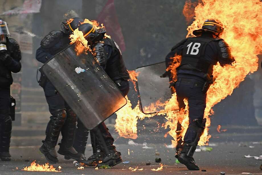 Αποτέλεσμα εικόνας για French police and protesters clash in Paris during May Day rally