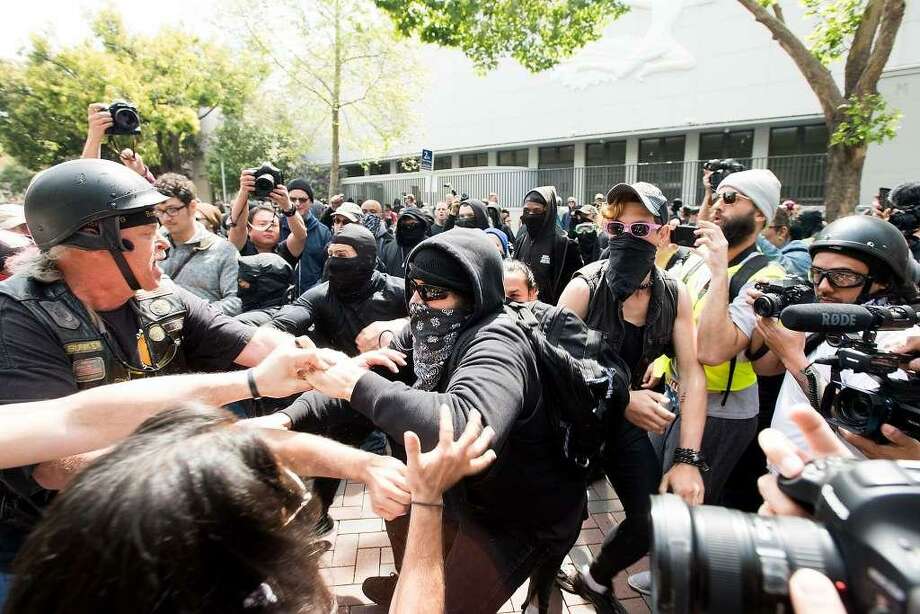Former professor arrested in beatings at Berkeley rally