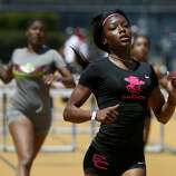 Kaylah Robinson from El Cerrito High School wins the girls 100 meter dash at the North Coast Section Meet of Champions in Berkeley, Calif. on Saturday, May 27, 2017.