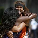 Santa Rosa High School's Kirsten Carter hugs Chinyere Okoro (left) from Amador Valley High after Carter narrowly defeated Okoro and took first place in the girls 100 meter run at the North Coast Section Meet of Champions in Berkeley, Calif. on Saturday, May 27, 2017.
