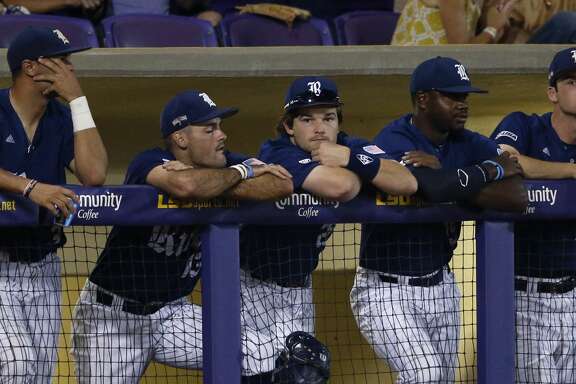 The Rice dugout watches during the ninth inning of an NCAA college baseball tournament regional game against LSU in Baton Rouge, La., Sunday, June 4, 2017. LSU won 5-0 to advance to the Super Regionals. (AP Photo/Gerald Herbert)