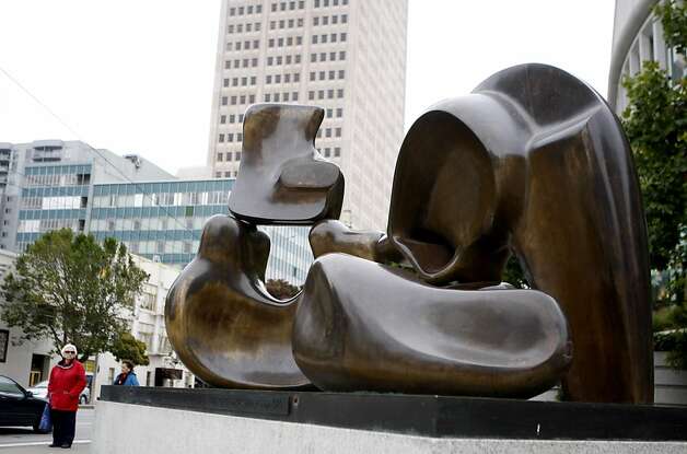 The Arts Commission has restored a bronze-and-steel sculpture by Henry Moore called "Large Four Piece Reclining Figure." The 1971 piece sits outside the Hall of Justice. Photo: Michelle Terris, The Chronicle