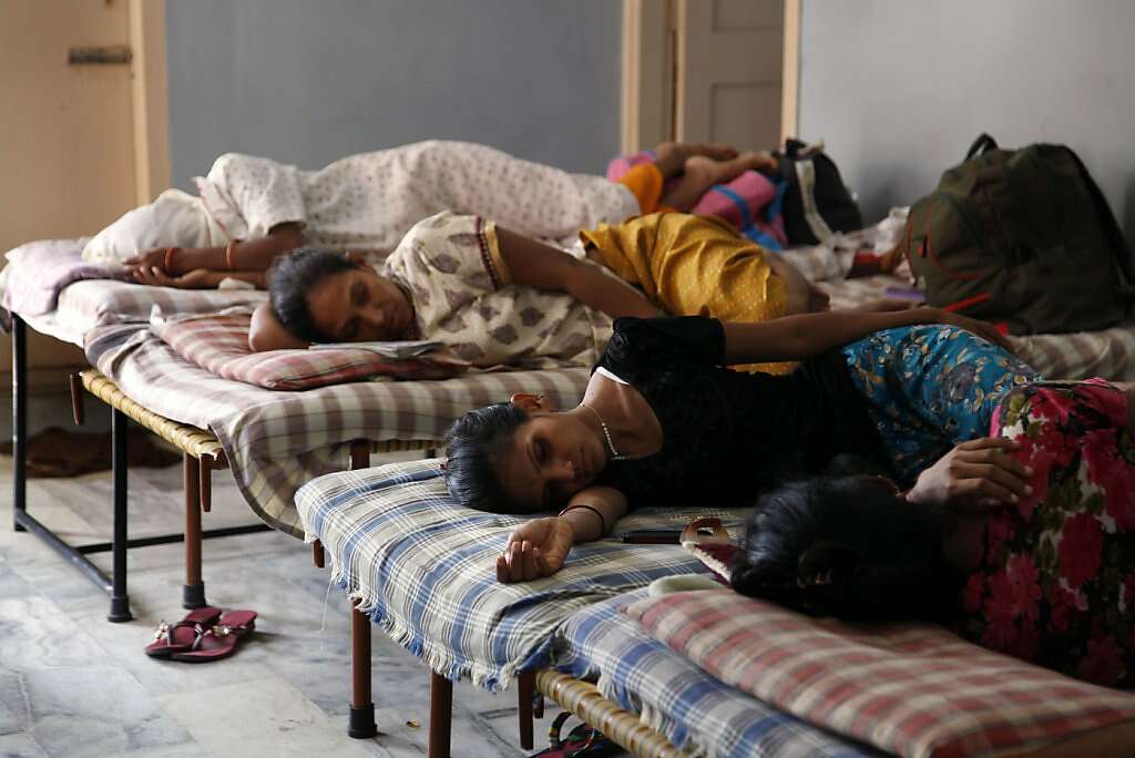 Surrogates sleep Akanksha Infertility Clinic's dormitories on the outskirts of Anand, Saturday, June 1, 2013. Surrogates remain in the dormitories and the clinic for almost all of their pregnancies -- a requirement, Dr. Patel says, that ensures their surroundings are secure and sanitary. Photo: Nicole Fruge, The Chronicle
