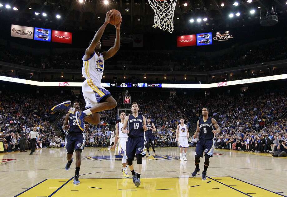 Golden State Warriors' Harrison Barnes (40) goes up for a dunk against the Memphis Grizzlies during the first half of an NBA basketball game Monday, April 13, 2015, in Oakland, Calif. (AP Photo/Marcio Jose Sanchez) Photo: Marcio Jose Sanchez, Associated Press