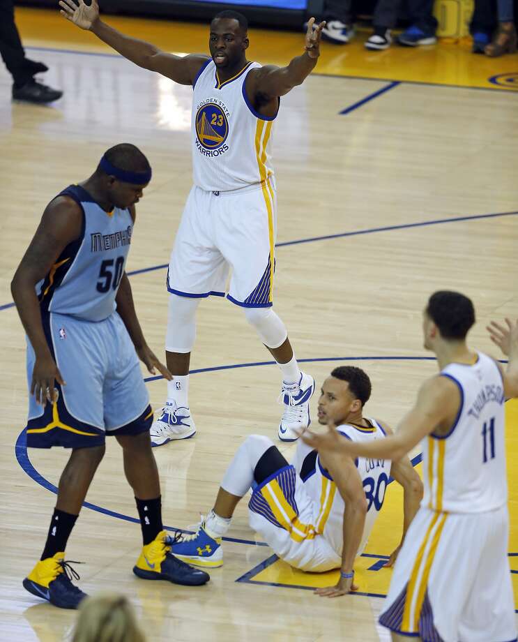 Golden State Warriors' Stephen Curry ends up on the court after being pushed down by Memphis Grizzlies' Zach Randolph in 1st quarter during Game 2 of NBA Playoffs' Western Conference Semifinals at Oracle Arena in Oakland, Calif., on Tuesday, May 5, 2015. Photo: Scott Strazzante, The Chronicle