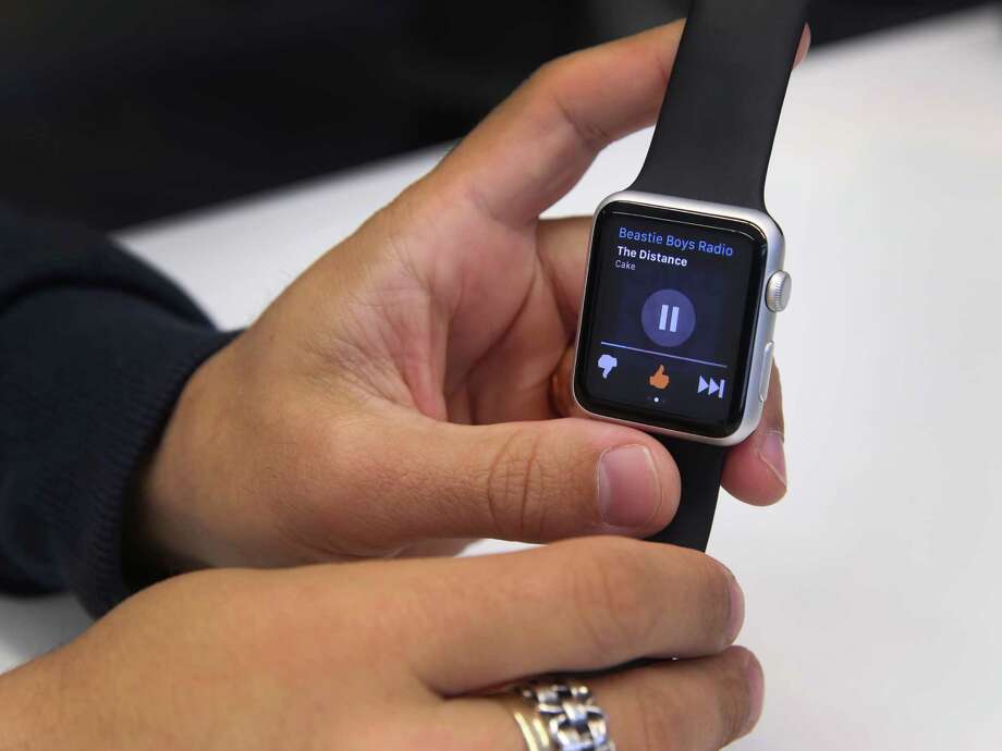 Pandora's lead product designer Jason Tusman demos the streaming music service on the Apple Watch in Oakland, Calif. on Wednesday, May 27, 2015. Photo: Paul Chinn, Staff / The Chronicle / ONLINE_YES