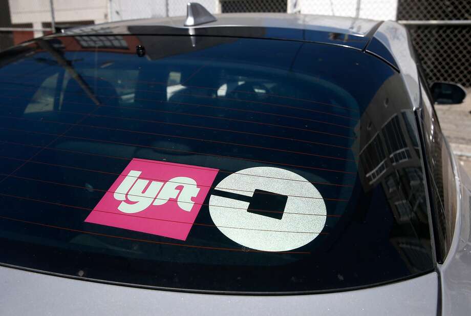 A fleet of Toyota Priuses are parked in the Evercar lot in San Francisco, Calif. on Aug. 30, 2016. Clients enrolling in the Evercar program can rent a Prius for $8 an hour to drive for either the Uber and Lyft ride sharing services. Photo: Paul Chinn, The Chronicle